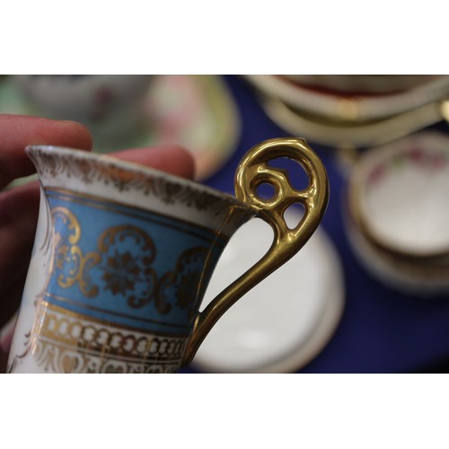 71 - A quantity of china, including a crimson and gilt decorated part combination service, a Dresden cup ... 