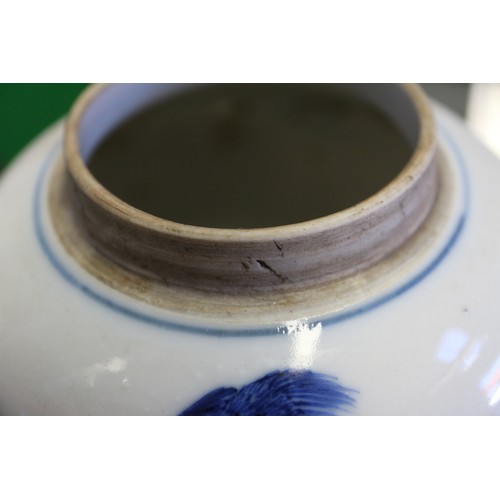 91 - A Chinese blue and white floral bird decorated pot-pourri jar with pierced hardwood cover and stand,... 