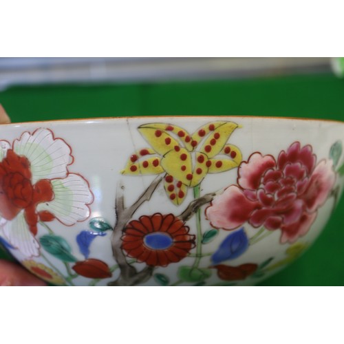 80 - A Chinese Famille Rose bowl with floral decoration, 4