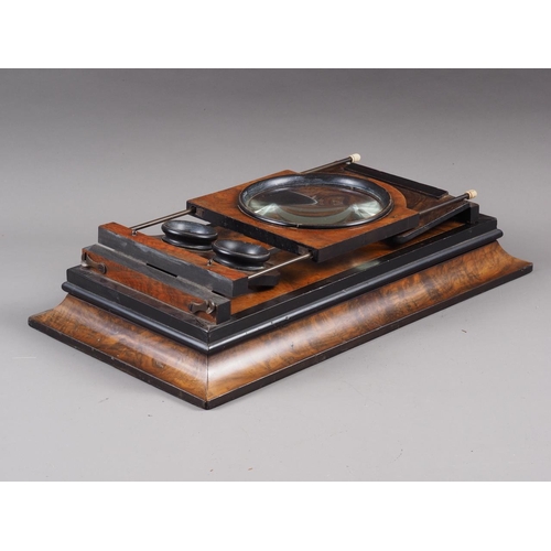 172 - A large stereoscope (graphoscope) with magnifying lens and twin lenses for viewing stereocards, full... 