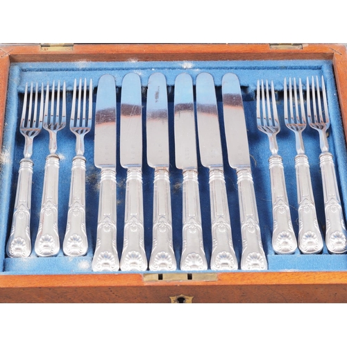 228 - A set of six early 19th century silver handled King's pattern fruit knives and forks with close plat... 