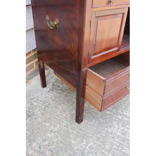 414 - A Georgian mahogany tray top bedside stand, fitted drawer over cupboards and deep drawer, on moulded... 