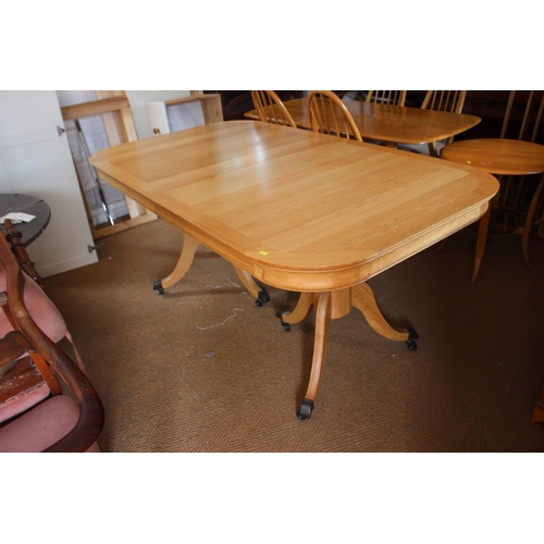 526 - A modern light oak dining suite comprising oval double pedestal extending table, 68