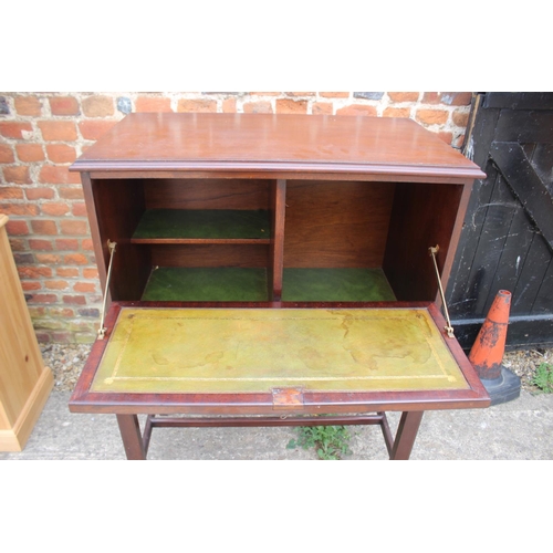 527 - A mahogany drinks cabinet of Georgian design with fall front, on stand with chamfered supports, 32