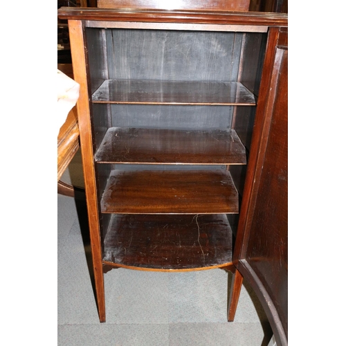 529 - An Edwardian mahogany and line inlaid music cabinet with ledge back and cupboard door enclosed three... 