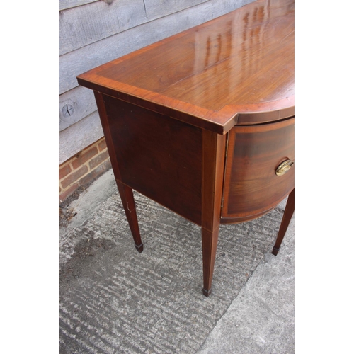 537 - A Sheraton Revival mahogany and satinwood banded break bowfront sideboard, fitted cupboard drawer an... 