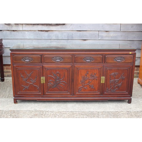 480 - A Chinese hardwood dining suite, comprising a dining table, on square taper supports with three leav... 