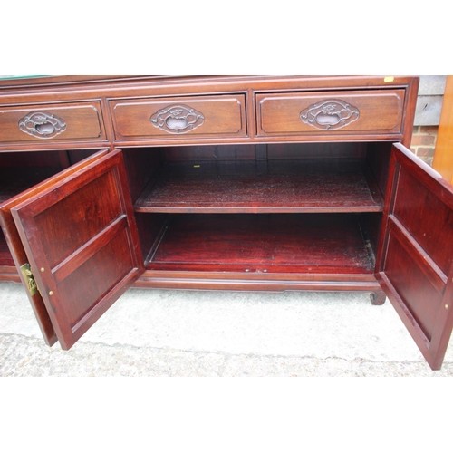 480 - A Chinese hardwood dining suite, comprising a dining table, on square taper supports with three leav... 