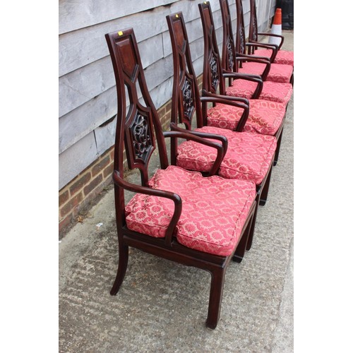 480 - A Chinese hardwood dining suite, comprising a dining table, on square taper supports with three leav... 