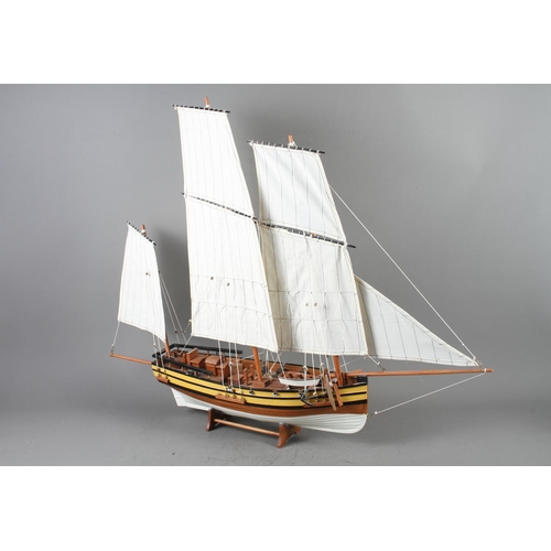 132 - A Nauticalia wooden scale model of a fully rigged privateer lugger, 26