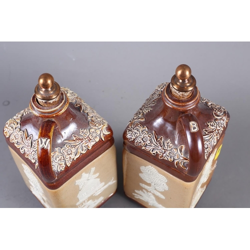 15 - A pair of Doulton sprigged stoneware spirit decanters and stoppers (damages), two similar coffee pot... 