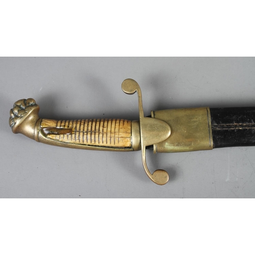 154 - A Midshipman's mid 19th century dirk with bone grip, brass cross guard and mask pommel, blade stampe... 