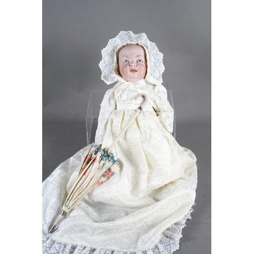 163 - A bisque headed doll, in cream lace trimmed gown, 15