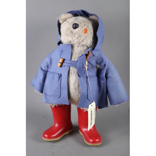 165 - An original Paddington Bear figure with red boots, 19