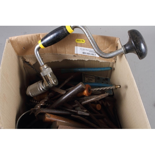 175 - A quantity of vintage and earlier tools, including manual drills, pliers, drill bits, etc