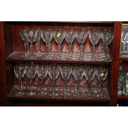 24 - A Gorham cut and gilt glass part table service of twenty-three white and sixteen red wine glasses, o... 