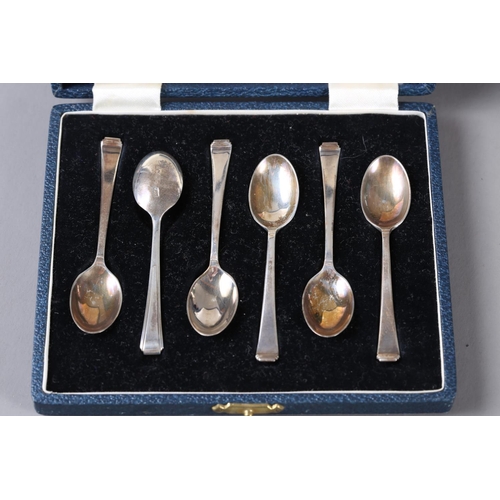 249 - A cased set of six silver egg spoons, a cased set of fish servers, napkin rings, etc