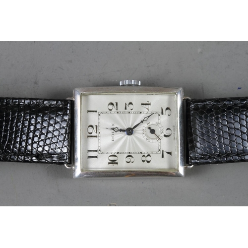 257 - A gentleman's 1920s silver cased rectangular Rolex wristwatch with silver guilloche enamel dial with... 