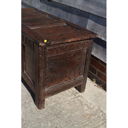 405 - An 18th century panelled oak coffer with three panel front and lid, 44