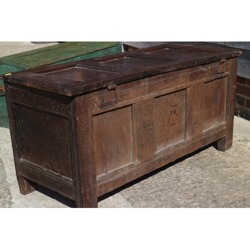 405 - An 18th century panelled oak coffer with three panel front and lid, 44