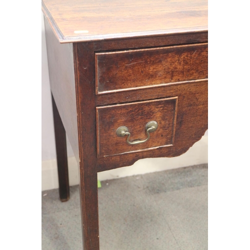 406 - A late 18th century oak lowboy, fitted three drawers, on square chamfered supports, 30