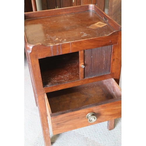 422 - A 19th century mahogany tray top bedside cupboard enclosed tambour shutter, over one drawer, on moul... 