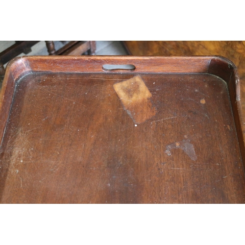 422 - A 19th century mahogany tray top bedside cupboard enclosed tambour shutter, over one drawer, on moul... 