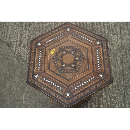 427 - A late 19th century marquetry hexagonal top occasional table, 16