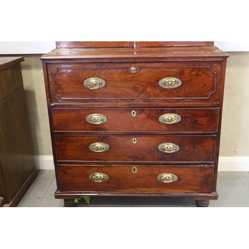 429 - A Georgian mahogany secretaire bookcase, the upper section enclosed two lattice glazed doors, over f... 