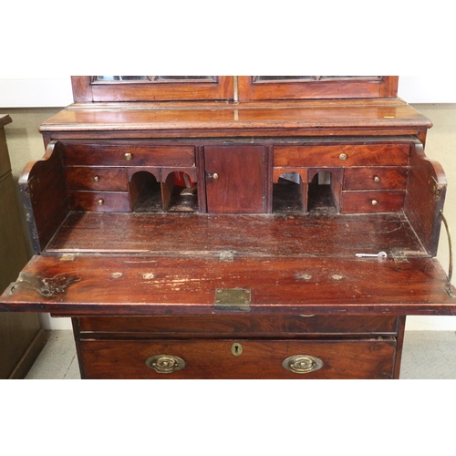 429 - A Georgian mahogany secretaire bookcase, the upper section enclosed two lattice glazed doors, over f... 