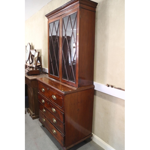 429 - A Georgian mahogany secretaire bookcase, the upper section enclosed two lattice glazed doors, over f... 