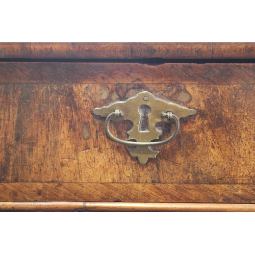 431 - An 18th century provincial figured walnut and banded chest of three small and three long graduated d... 