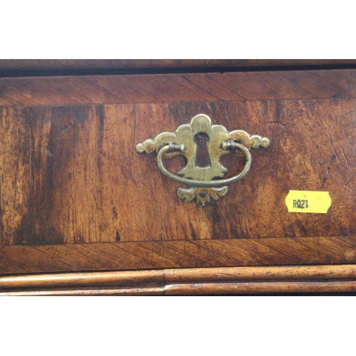 431 - An 18th century provincial figured walnut and banded chest of three small and three long graduated d... 