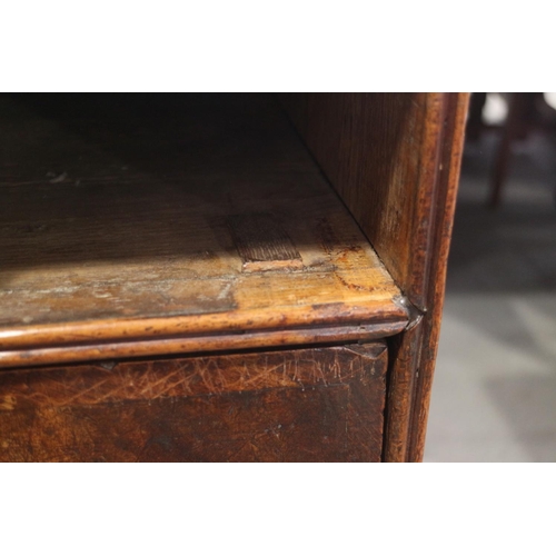 431 - An 18th century provincial figured walnut and banded chest of three small and three long graduated d... 