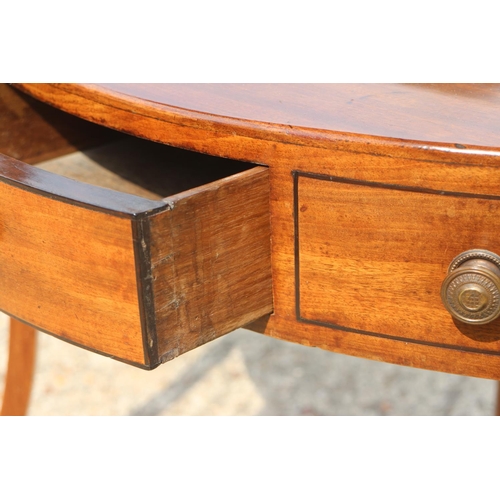 435 - A 19th century mahogany bowfront corner washstand, fitted one drawer, on splay supports, 24