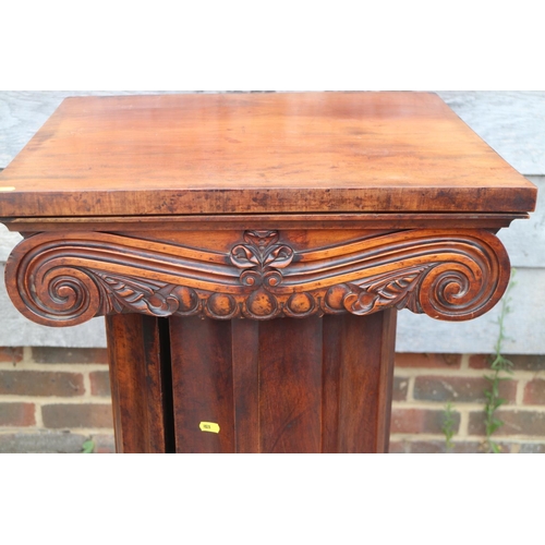 436 - A 19th century carved walnut washstand, formed as a column with Ionic capital lift up lid, on square... 