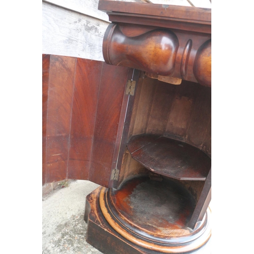 436 - A 19th century carved walnut washstand, formed as a column with Ionic capital lift up lid, on square... 