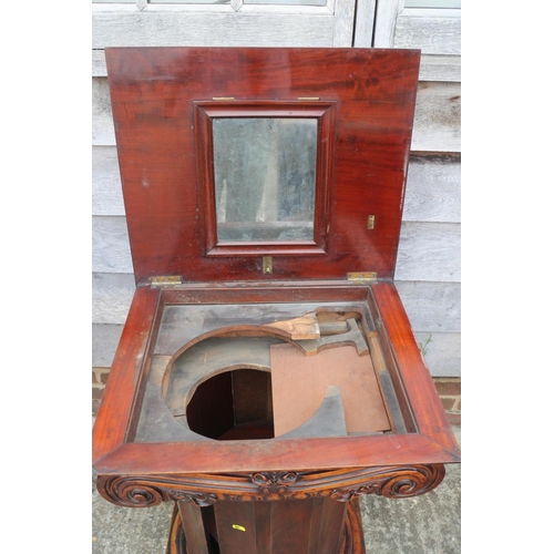 436 - A 19th century carved walnut washstand, formed as a column with Ionic capital lift up lid, on square... 