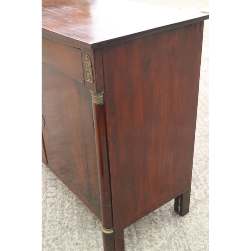 437 - A 19th century Continental walnut sideboard, fitted one long drawer, over two doors with flanking co... 