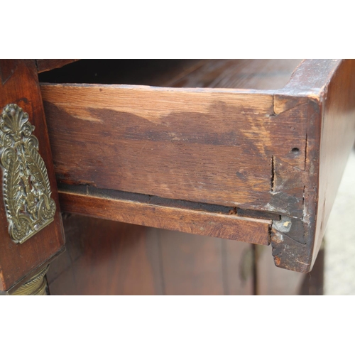 437 - A 19th century Continental walnut sideboard, fitted one long drawer, over two doors with flanking co... 