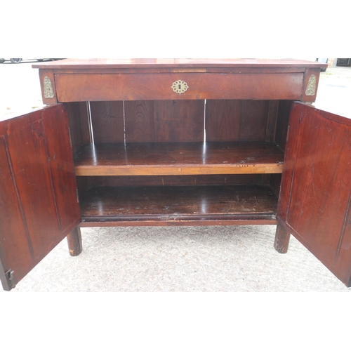 437 - A 19th century Continental walnut sideboard, fitted one long drawer, over two doors with flanking co... 