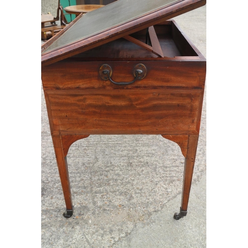 439 - An architect's 19th century mahogany table with adjustable tooled leather lined top, fitted two draw... 