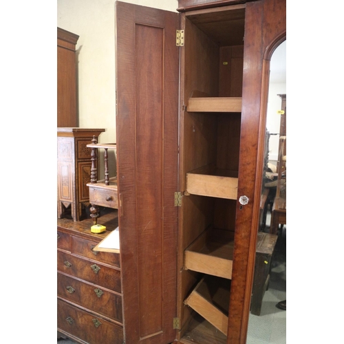 447 - A 19th century plum pudding figured mahogany wardrobe enclosed mirror door and narrow side door, ove... 