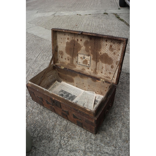 451 - An antique studded coffer with carry handles, 30