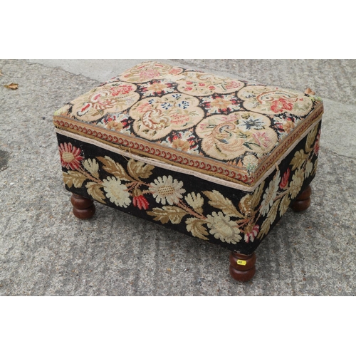 452 - A 19th century box seat ottoman, upholstered in a floral tapestry, on turned supports, 26