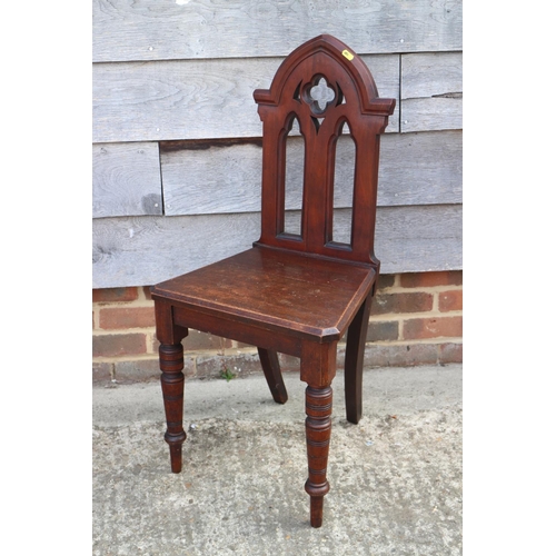 461 - A 19th century mahogany Gothic pierced splat back hall chair