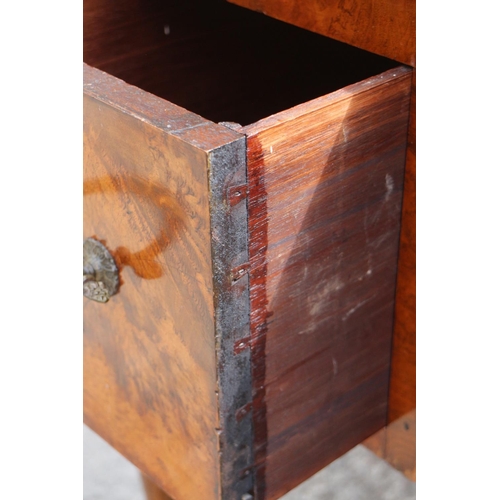 493 - A figured walnut dressing table, fitted three drawers, on cabriole supports, 41