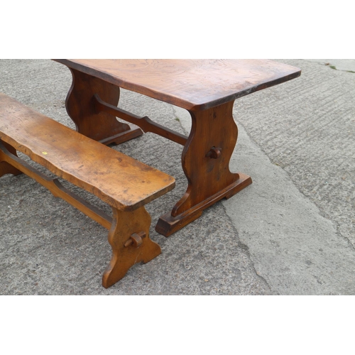 513 - An elm plank top refectory table and matching bench with panel end supports and shaped stretchers, 5... 