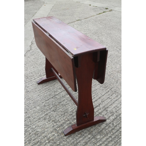 516 - A polished as mahogany drop leaf table, 42