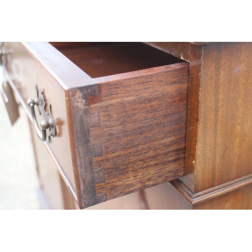 535 - A mahogany side cupboard, fitted two drawers over two doors, 39